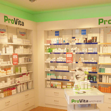 Folierung der Einrichtung in einer Apotheke mit der Marke ProVita.
